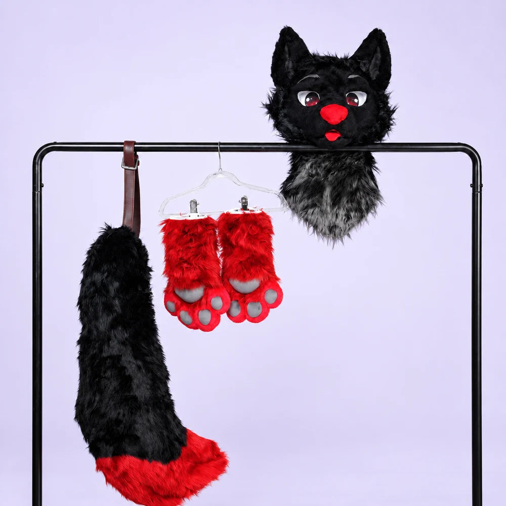 Black and red, shown with a head, handpaws and tail. — AI-retouched photograph